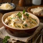 Garlic Parmesan Chicken Pasta in rustic bowl