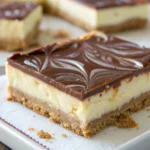 Best Nutella Cheesecake Bars with a creamy Nutella swirl.