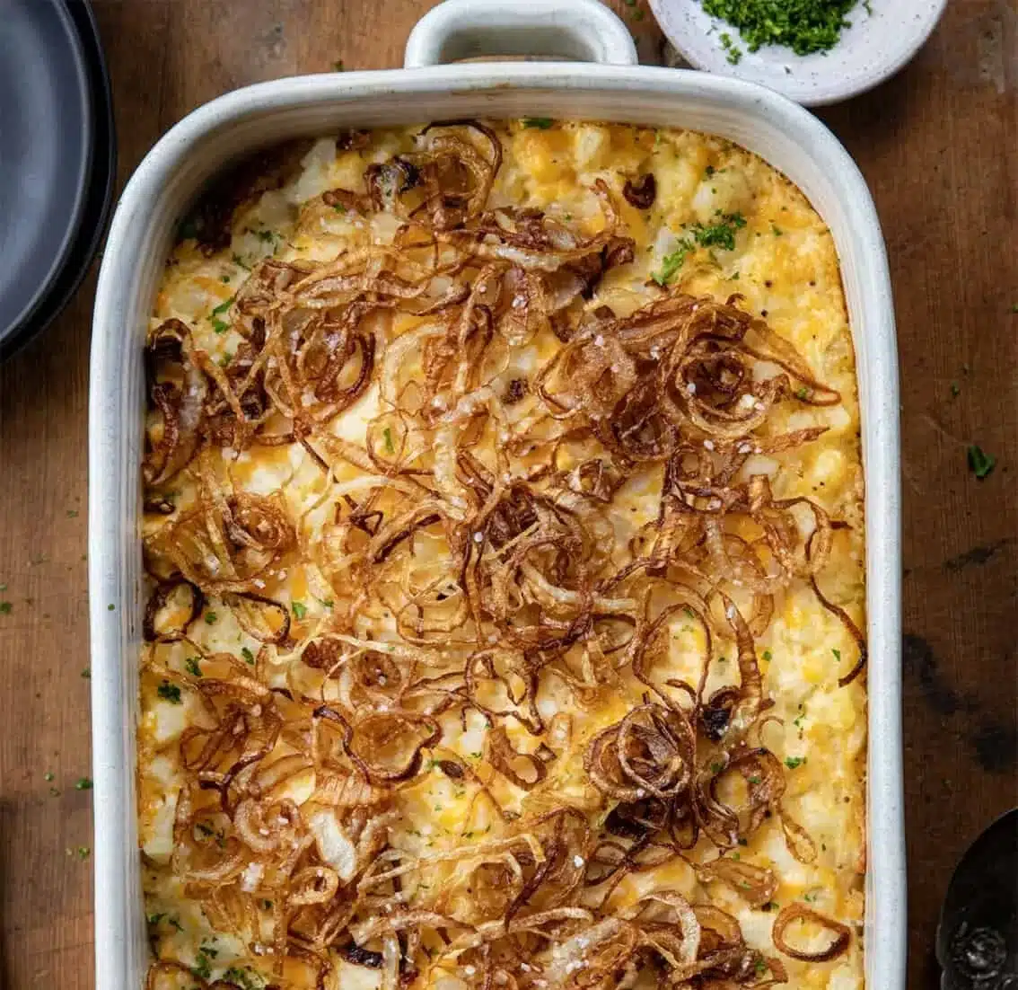 Deliciously creamy French Onion Funeral Potatoes served in a dish